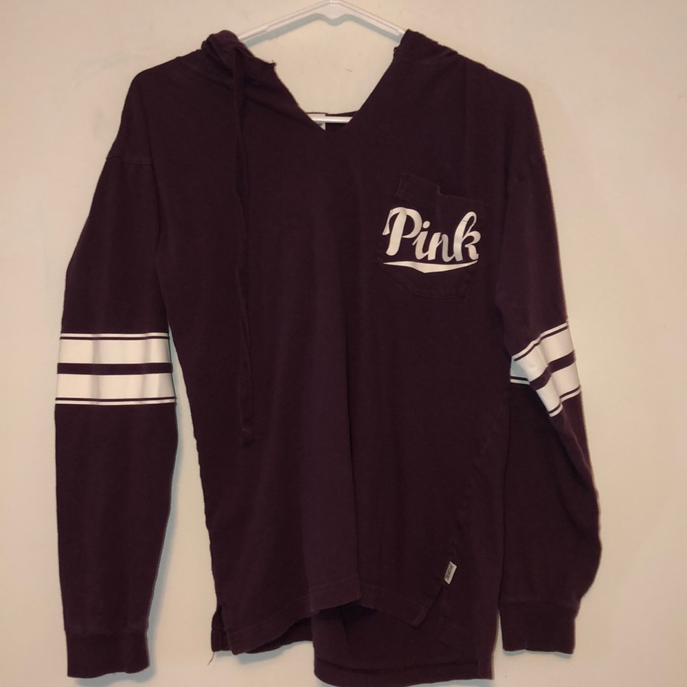 a pink t-shirt with hood